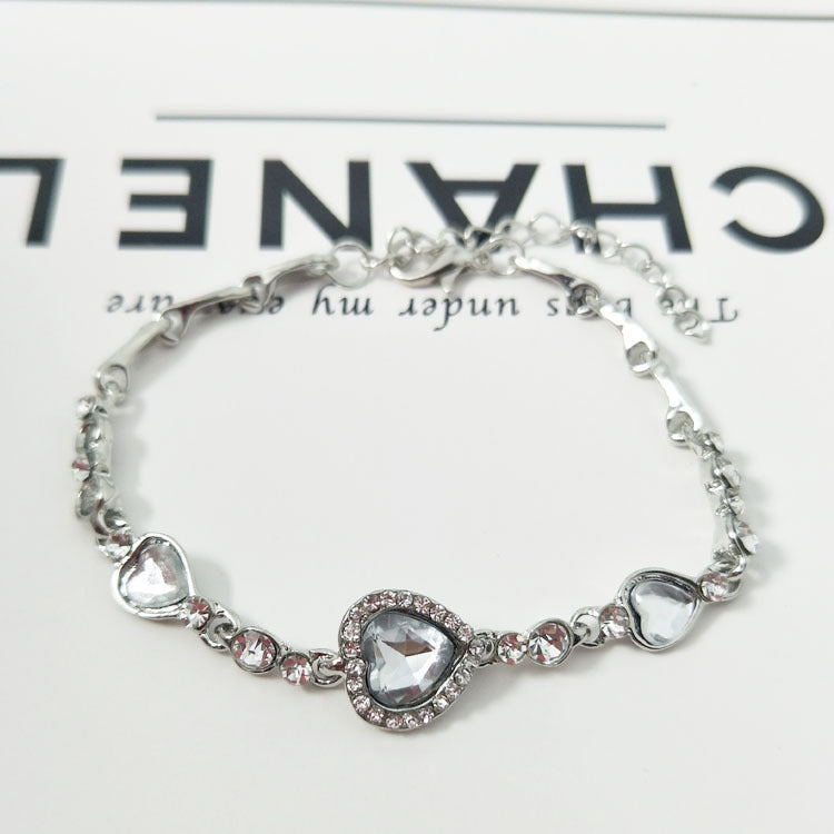 Delicate heart charm bracelet for women